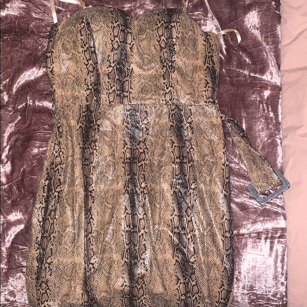 Size small dress that has a unique snake design